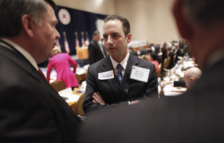 Reince Priebus, of the Wisconsin Republican Party, talks with members during the Republican National Committee meeting today.