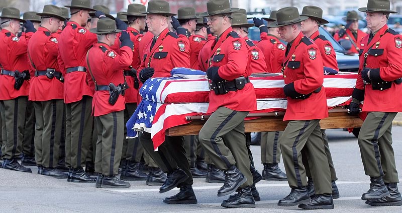 Thousands attend game warden's funeral