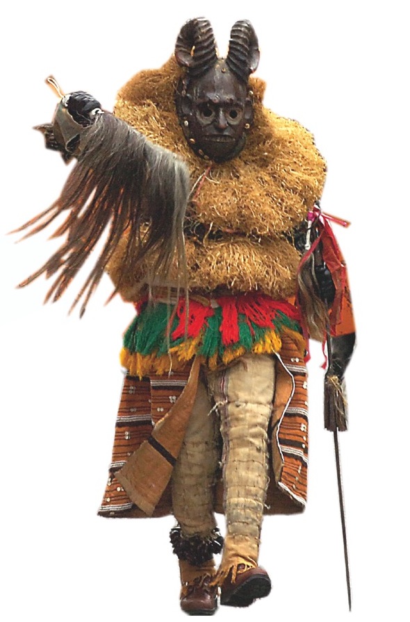 Oscar Mokeme in a costume and mask passed down through his family at Ebune 2008.