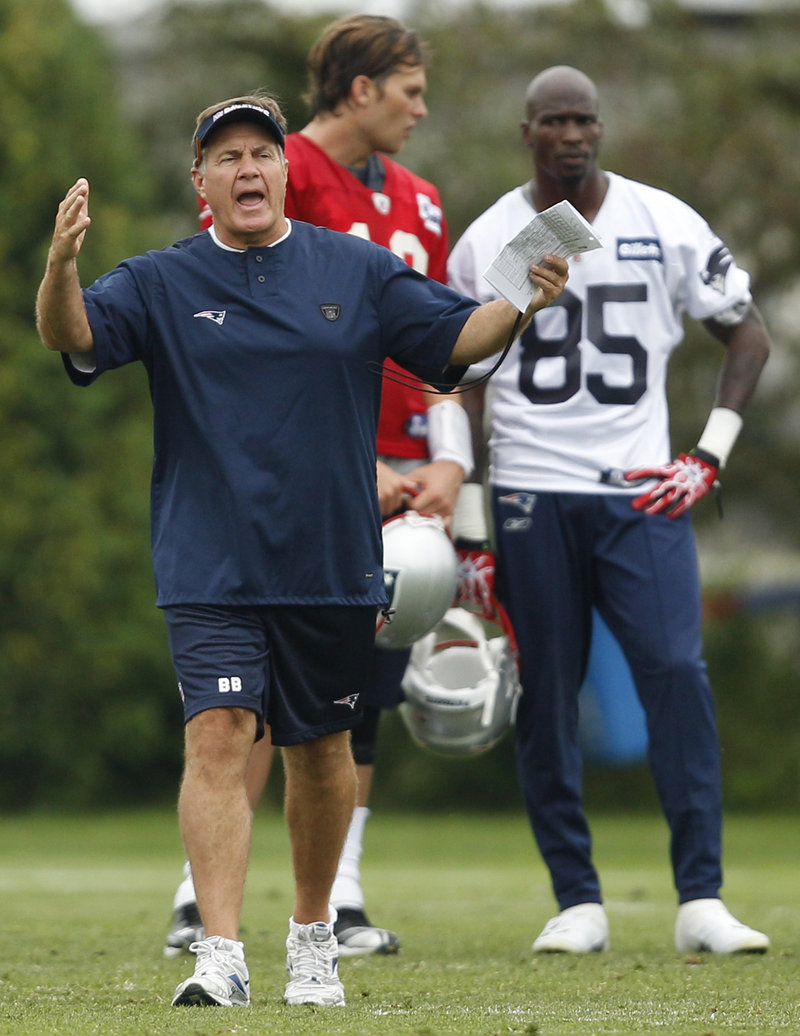 Ochocinco hits it off with new teammates at Patriots camp