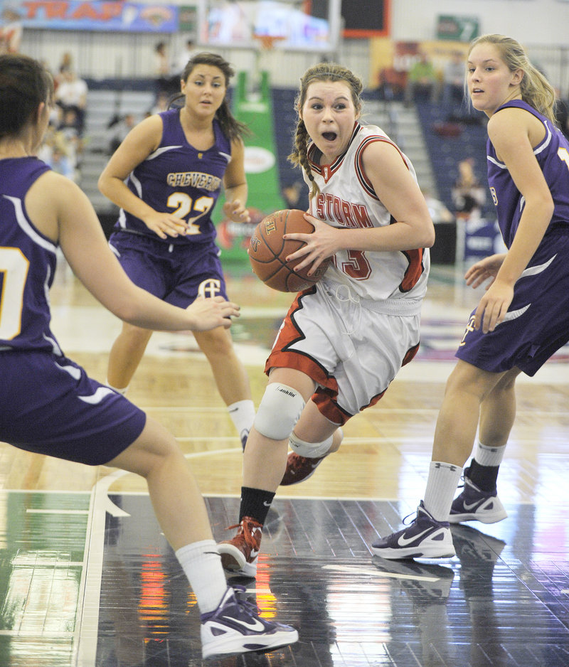 Mary Redmond of Scarborough drives past Cheverus defenders during the Red Storm’s Western Class A quarterfinal win.