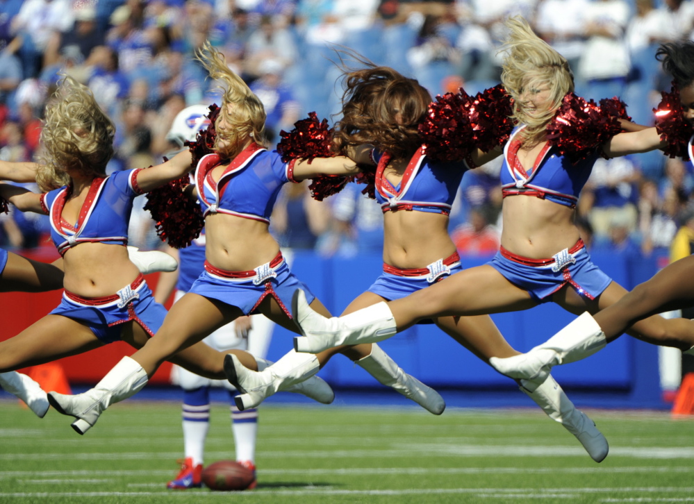 Cheerleaders Perform During Patriots - Bills Game