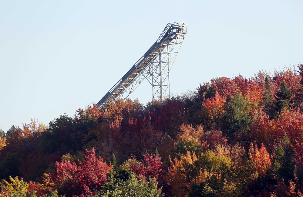 This Sept. 26 photo shows the top of the Nansen Ski Jump above the top of the tree line in Milan, N.H. The legendary  ski jump for decades lured some of the biggest names in jumping and was host to Olympic tryouts, World Cup competitions and four national championships before its last competition in 1985. Now members of the Nansen Ski Club, local historians and the state Department of Resources and Economic Development are hoping to revive the dilapidated jump and make it a tourist attraction (AP Photo/Jim Cole)