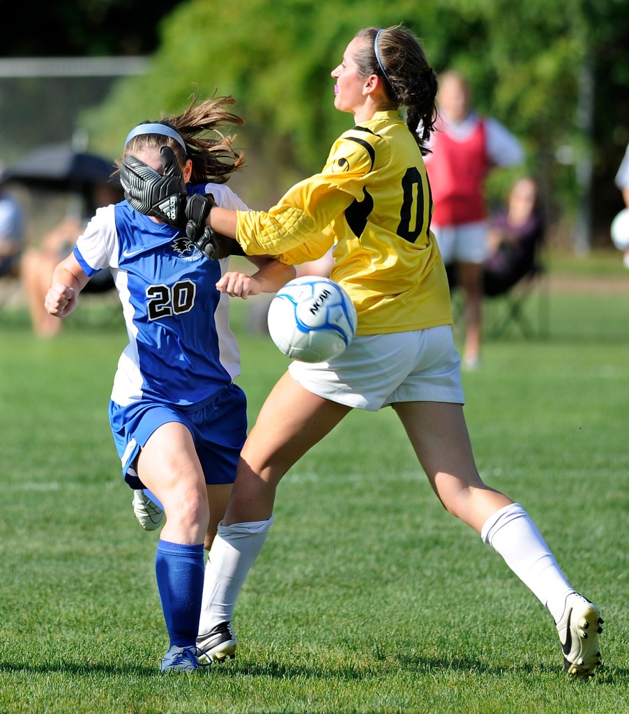 Sacopee Valley’s Abby Hughes gets a shot past Freeport goalie Izzy Qualls, but misses the net Wednesday in a girls’ soccer game at Freeport.  Gordon Chibroski/Staff Photographer