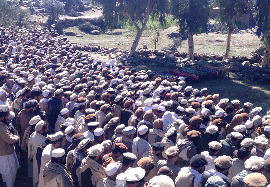 Afghan men offer funeral prayers in front of the bodies of killed people by earthquake in Chawkay district of Kunar Province east of Kabul, Afghanistan, Tuesday. The Associated Press