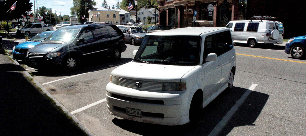 Cars are parked Monday along Main Street in Fairfield, where several cars have been burglarized in the last 10 days. Police Chief Tom Gould cautioned drivers to make sure their cars are locked when parked downtown.