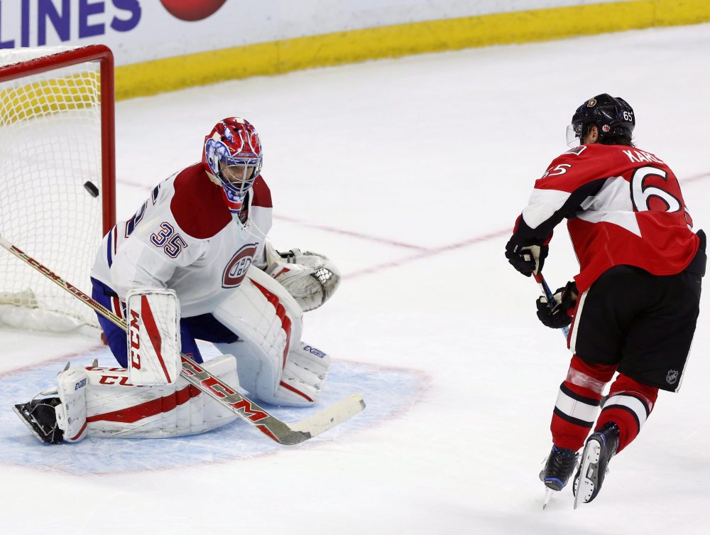 Ottawa's Erik Karlsson scores on Montreal goalie Al Montoya in a shootout Saturday night to give the Senators a 4-3 win in Ottawa, Ontario.