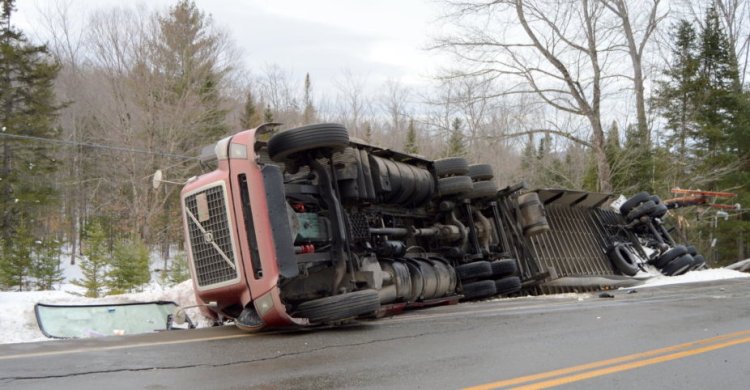 The driver was not injured Thursday afternoon when his tractor-trailer went off the road and rolled over on Route 27 in New Vineyard.