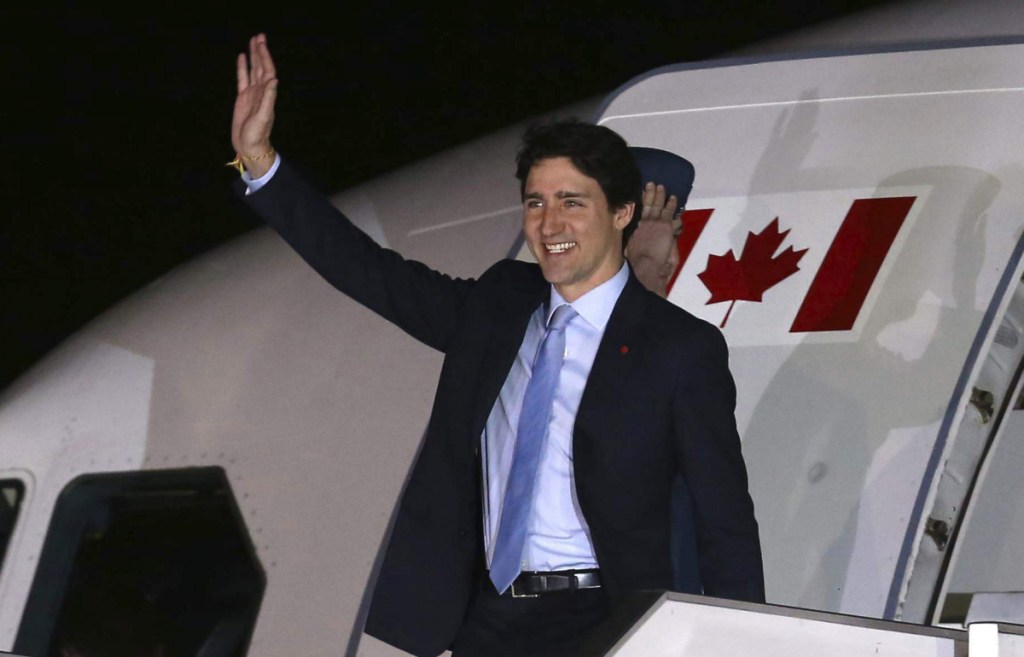 Canada's Prime Minister Justin Trudeau waves upon arrival in Lima, Peru, on April 12. Trudeau was in Lima to attend the Summit of the Americas.
