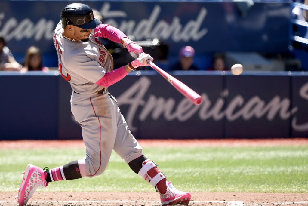 Boston Red Sox superstar Mookie Betts hits a 3-run home run