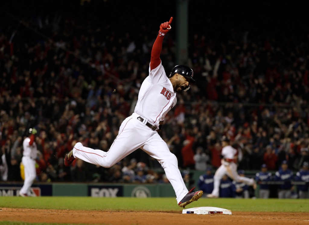 Manny homers at Fenway, but Sox win in 9th