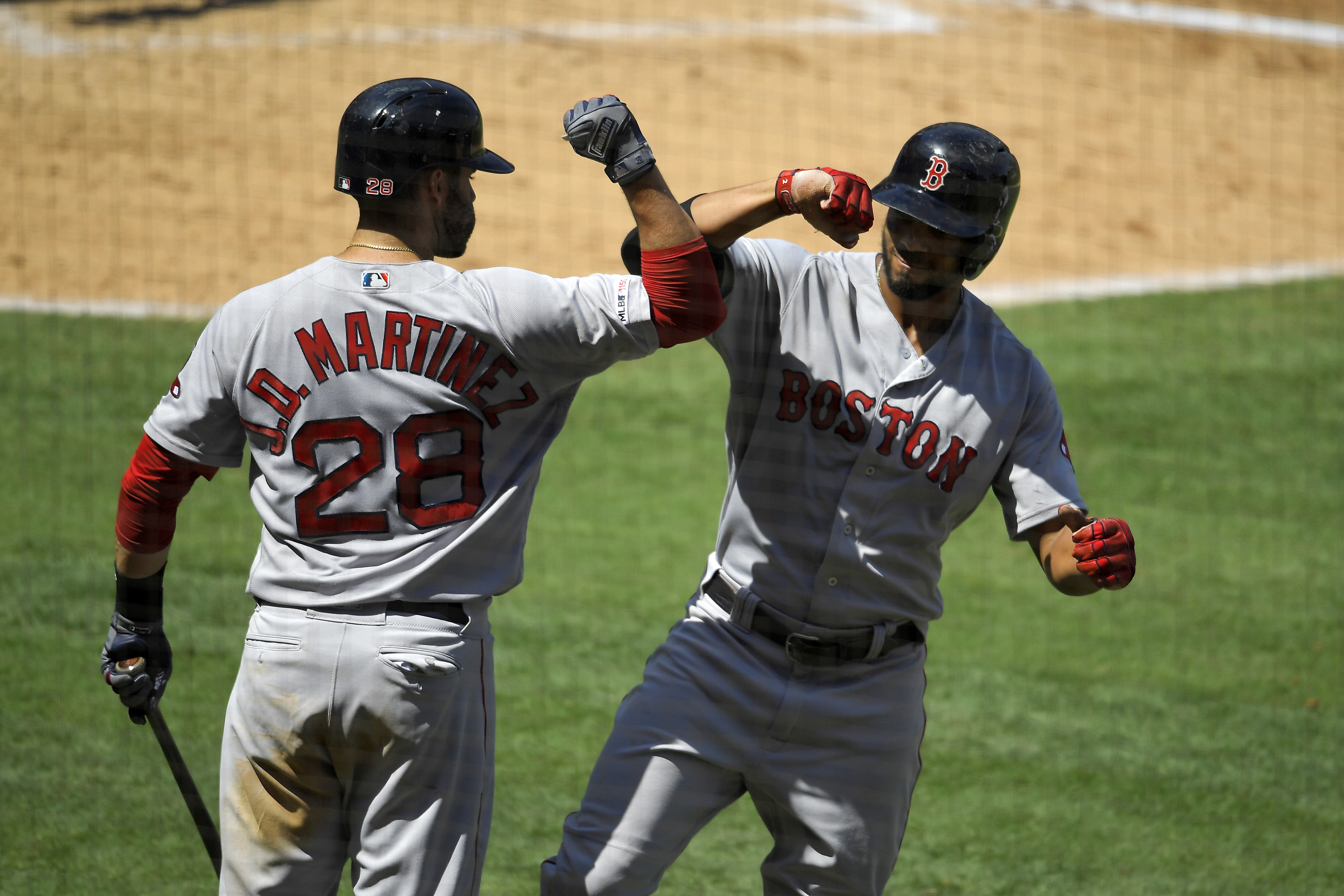 J.D. Martinez hits two homers as Red Sox win season finale