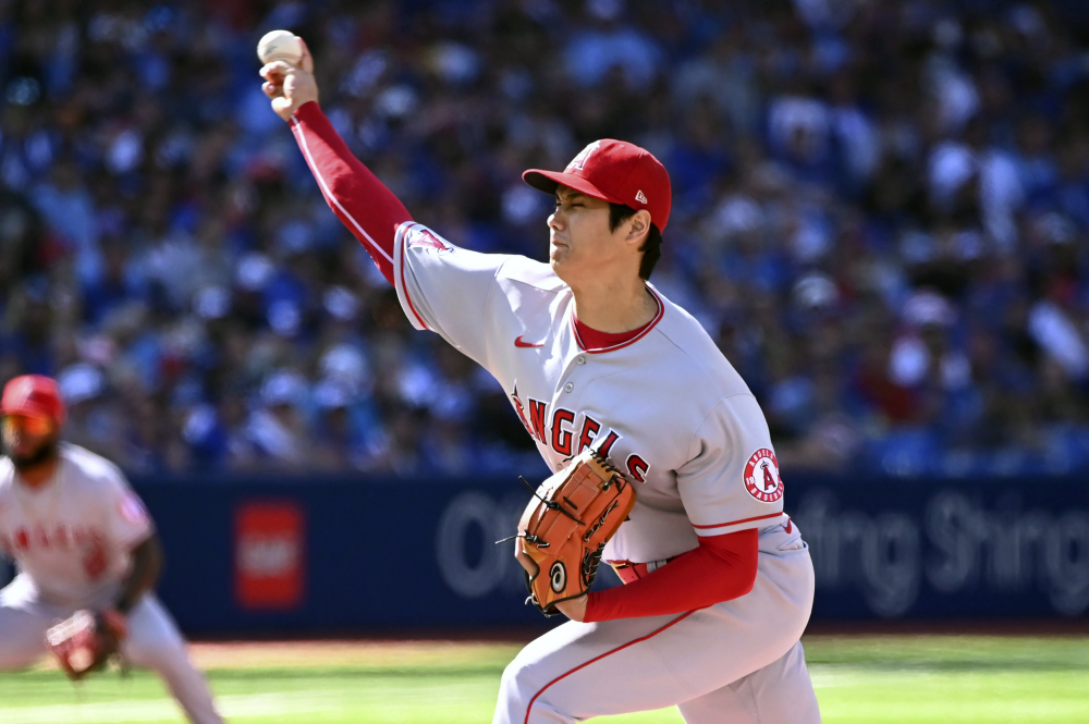 Shohei Ohtani strikes out 10, but A's beat Angels 3-2 in 10 to stay in wild  card race