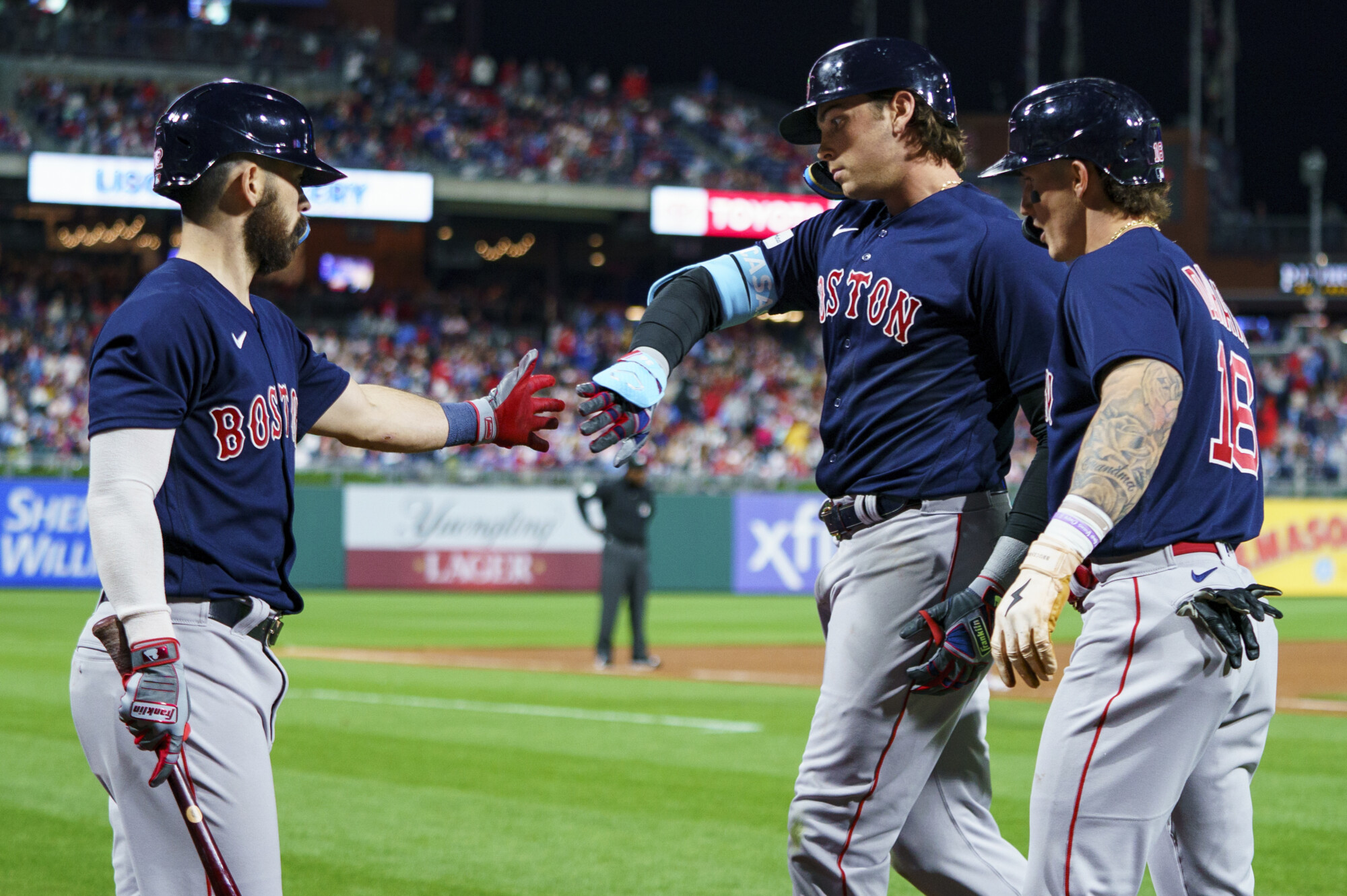 Red Sox rally for rain-delayed win over Toronto