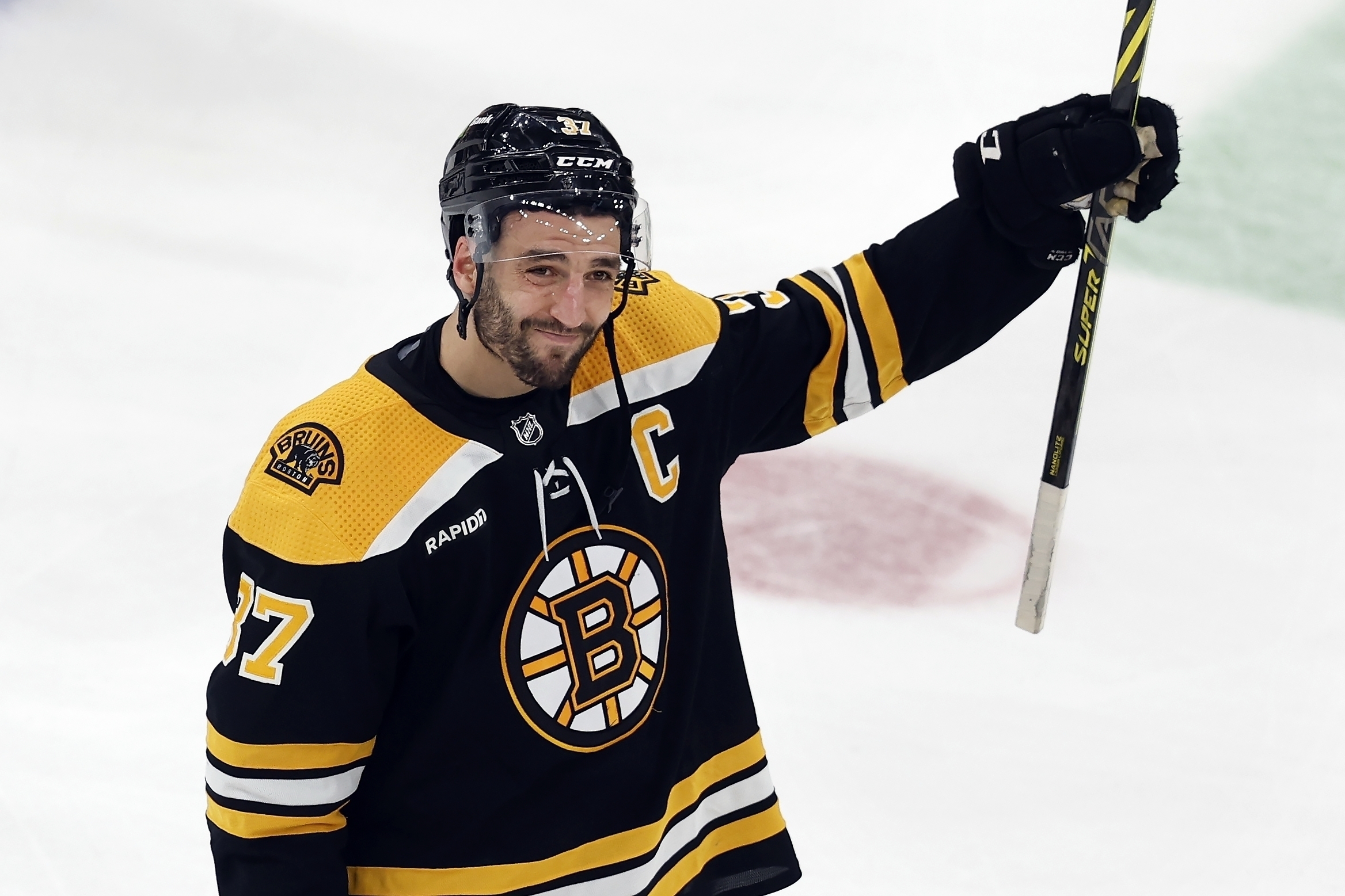 Bruins beat the winless Sharks 3-1 for their 3rd straight win