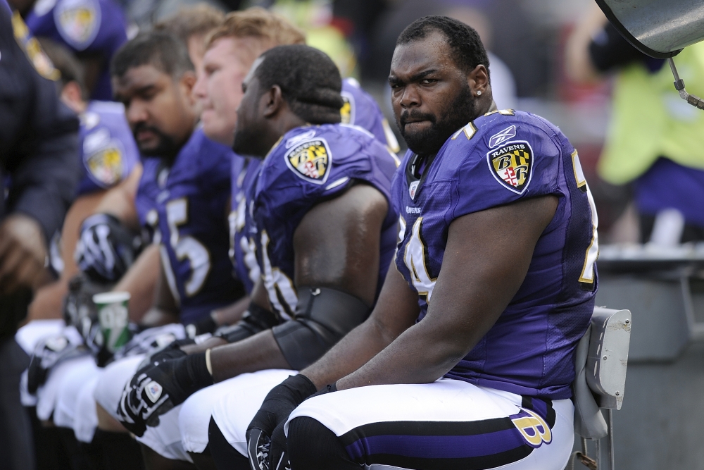 Leigh Ann Touhy and Michael Oher Celebrate Super Bowl Victory 