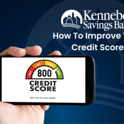 A hand holds a smart phone with a credit score scale on it. The score is 800, in the green "good" segment.