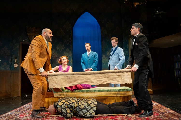 Left to right: Nicholas Mongiardo-Cooper*, Laura Darrell*, Ross Cowan*, Dean Linnard*, Max Samuels*, and Khalil LeSaldo* react to another outrageous disaster in the winter production of The
Play that Goes Wrong at Portland Stage. (*Member AEA)